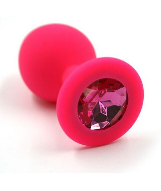Розовая силиконовая анальная пробка с тёмно-розовым кристаллом - 7 см.